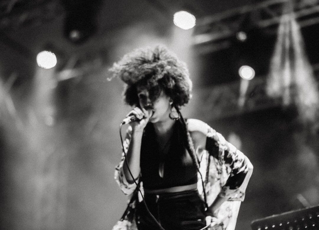singer performing on stage