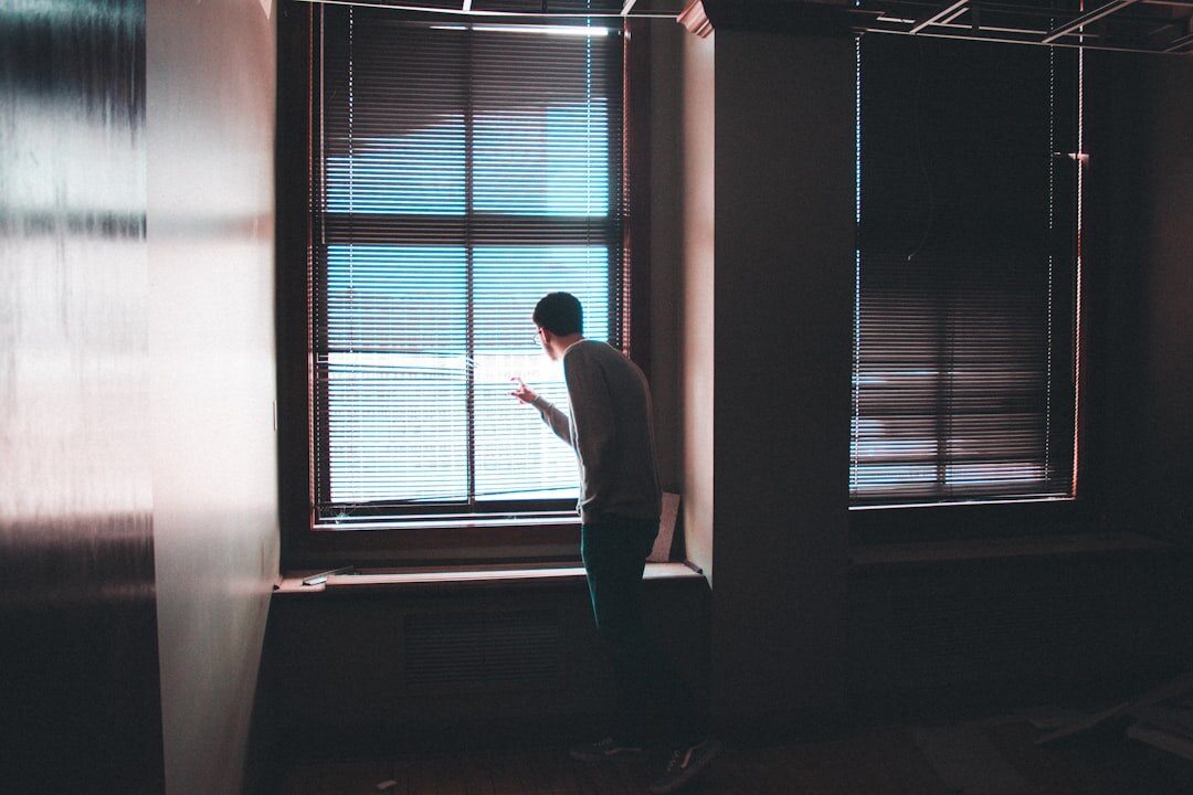 lonely person at window